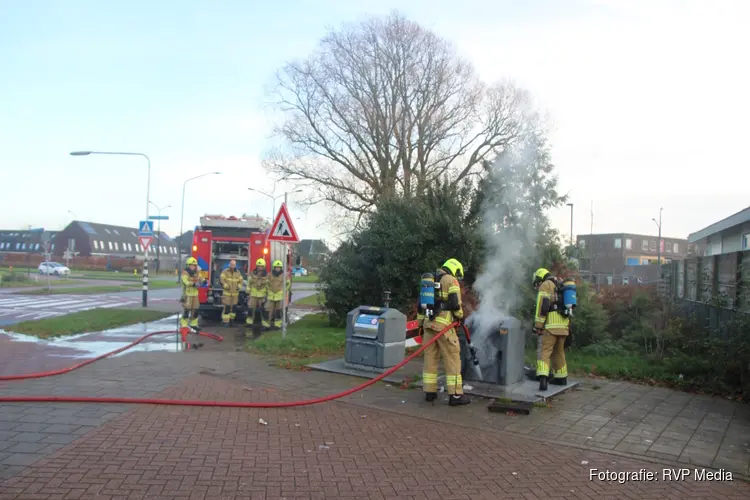 Ondergrondse container vat vlam door vuurwerk