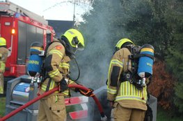 Ondergrondse container vat vlam door vuurwerk