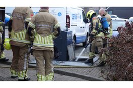 Bewoners blussen ondergrondse containerbrand