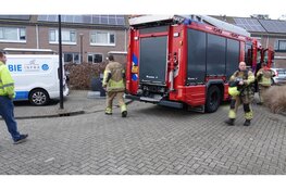 Bewoners blussen ondergrondse containerbrand