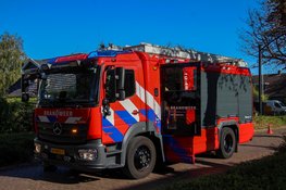 Bewoonster blust brandend bankstel in woning aan Stationsweg in Heerhugowaard